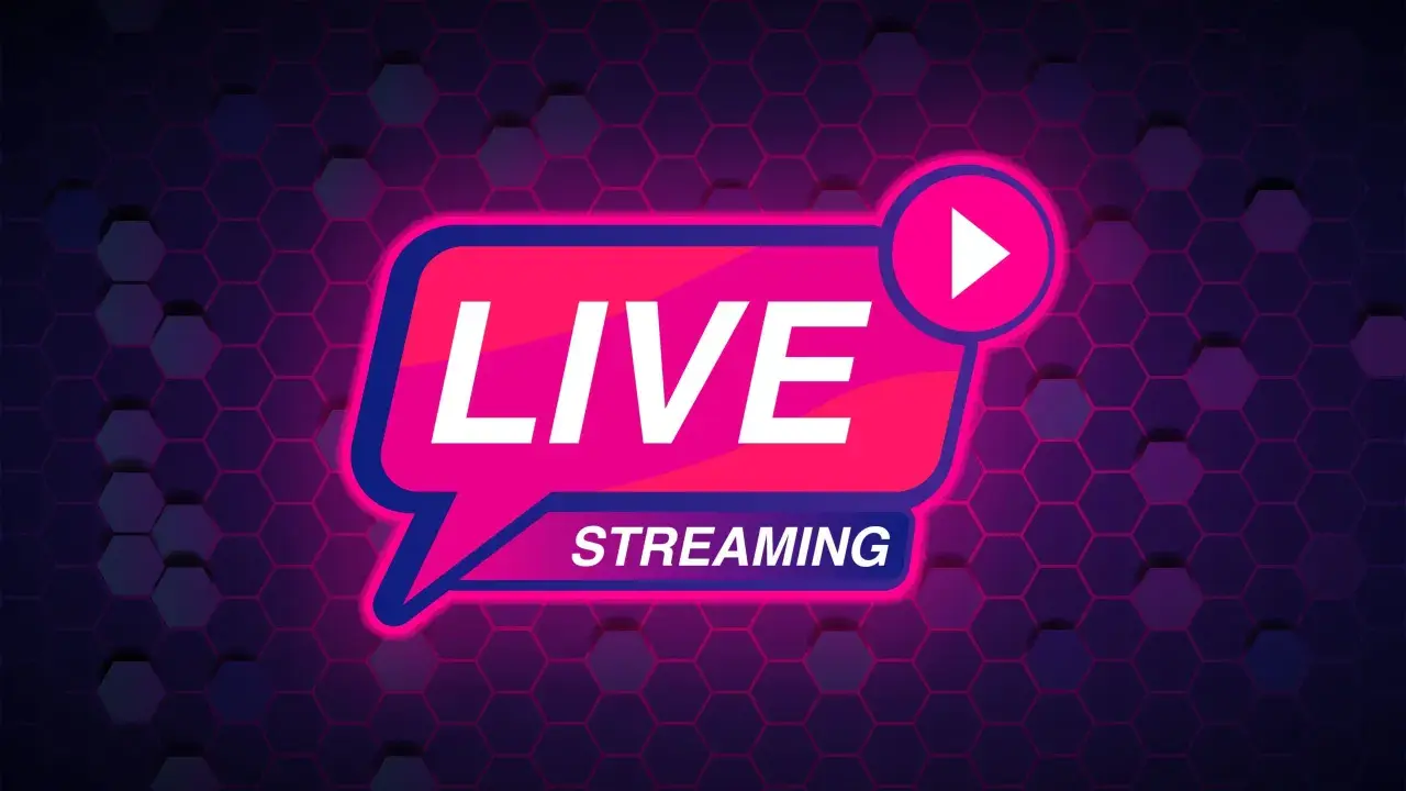 Neonowy napis LIVE STREAMING z ikoną play na tle heksagonalnej siatki. To jest to, co oznacza live streaming.