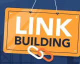 Tablica z napisem "LINK BUILDING" i symbolem łańcucha. Kluczowy element strategii seo backlink.