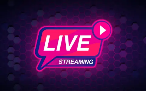 Neonowy napis LIVE STREAMING z ikoną play na tle heksagonalnej siatki. To jest to, co oznacza live streaming.